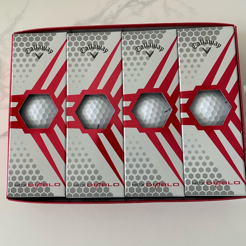 12 golf balls new in box
